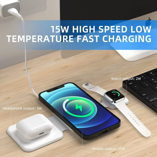 3-in-1 wireless charger FD-308 charging a phone, smartwatch, and earbuds simultaneously on a wooden desk