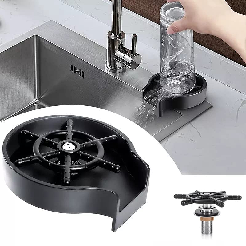 Black cup washer faucet attachment mounted on a kitchen sink, rinsing a glass bottle with high-pressure water spray.