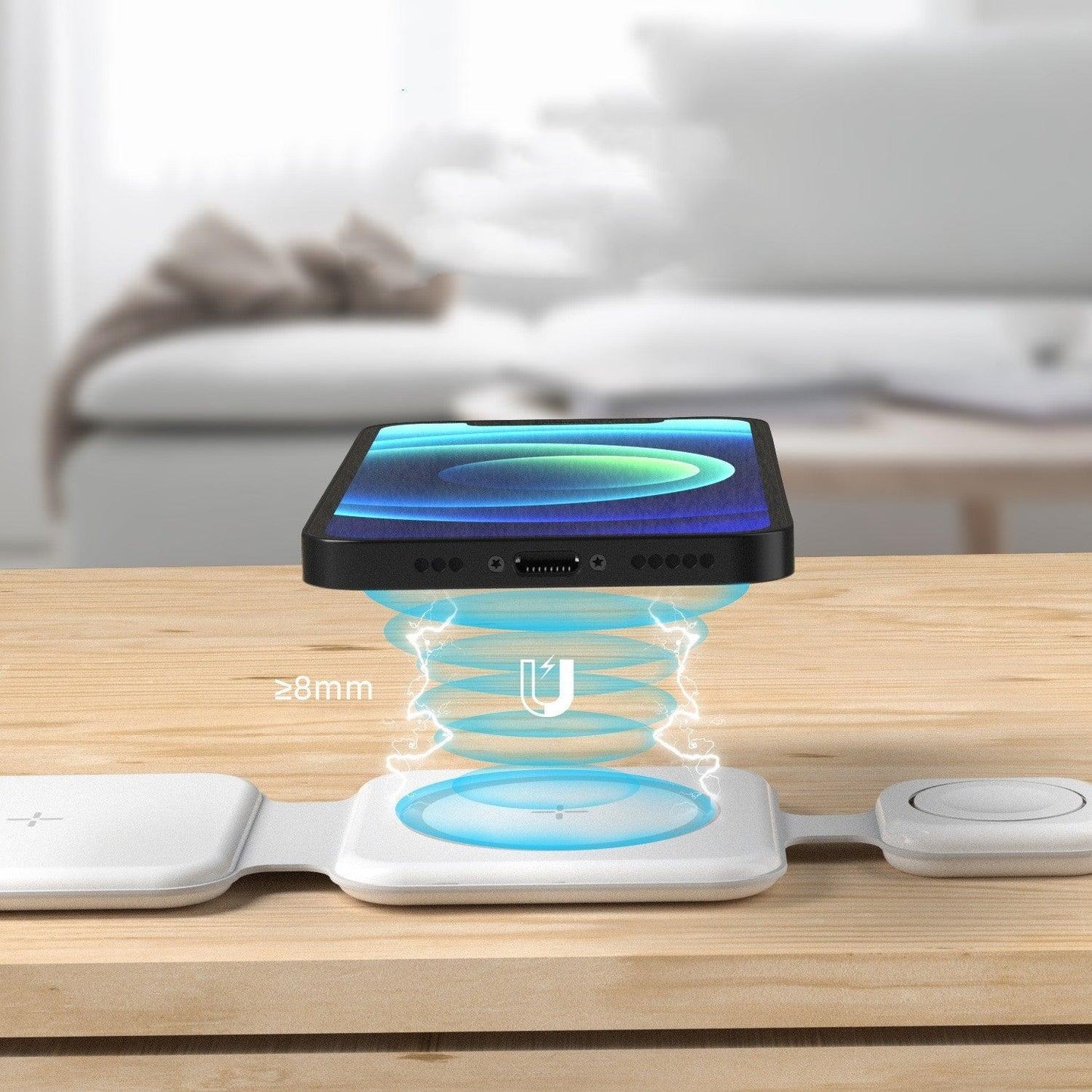 Magnetic wireless charging animation showing phone aligning above charger (≥8mm distance).