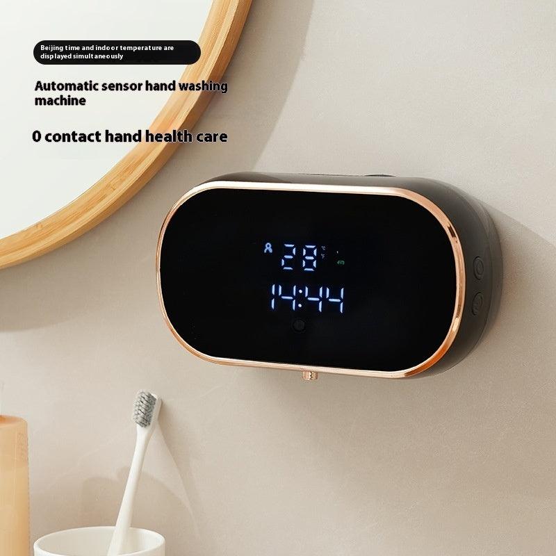 Wall-mounted automatic sensor soap dispenser with LED display, promoting touchless hand hygiene.