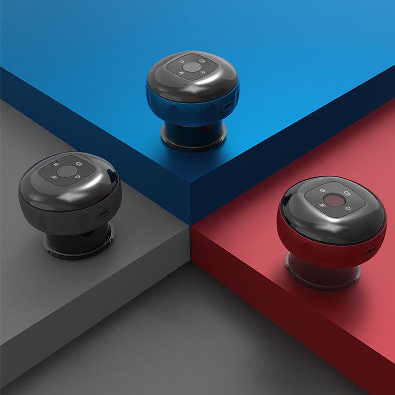 Three electric cupping massagers in different colors displayed on geometric colored surfaces