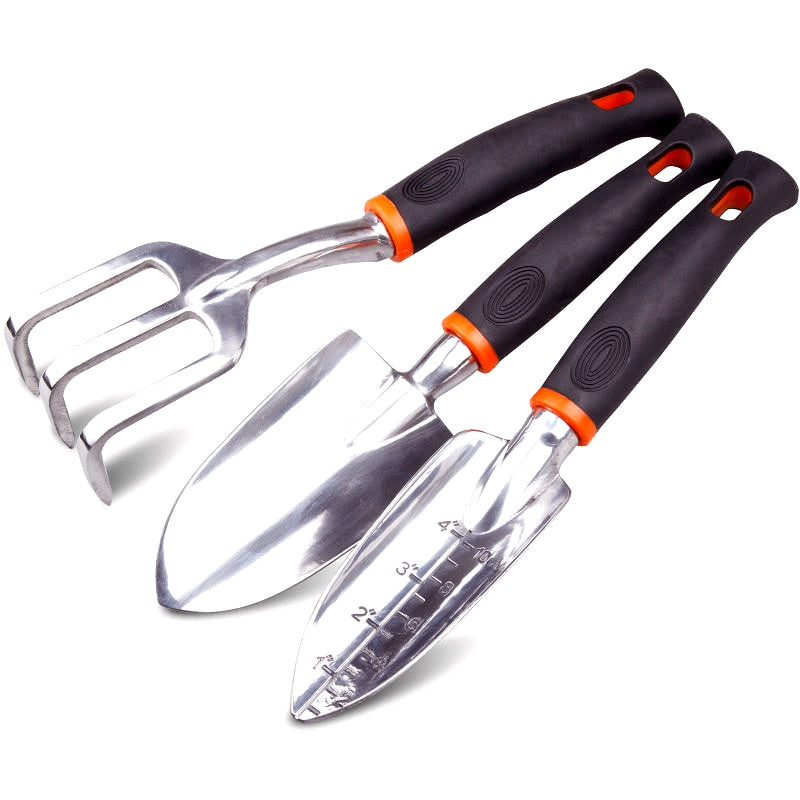 Three-piece garden tool set with rubberized handles on a white background