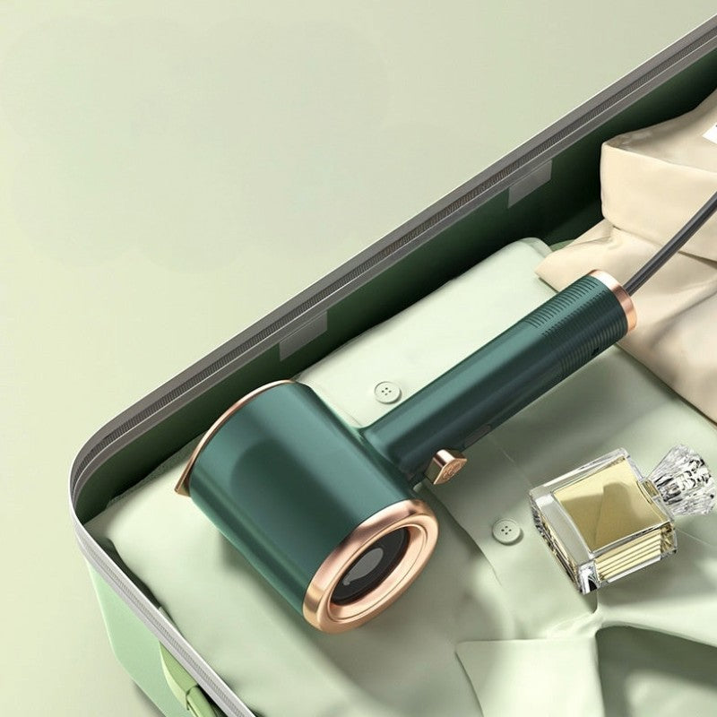 Portable Handheld Garment Steamer green – compact design for travel in suitcase