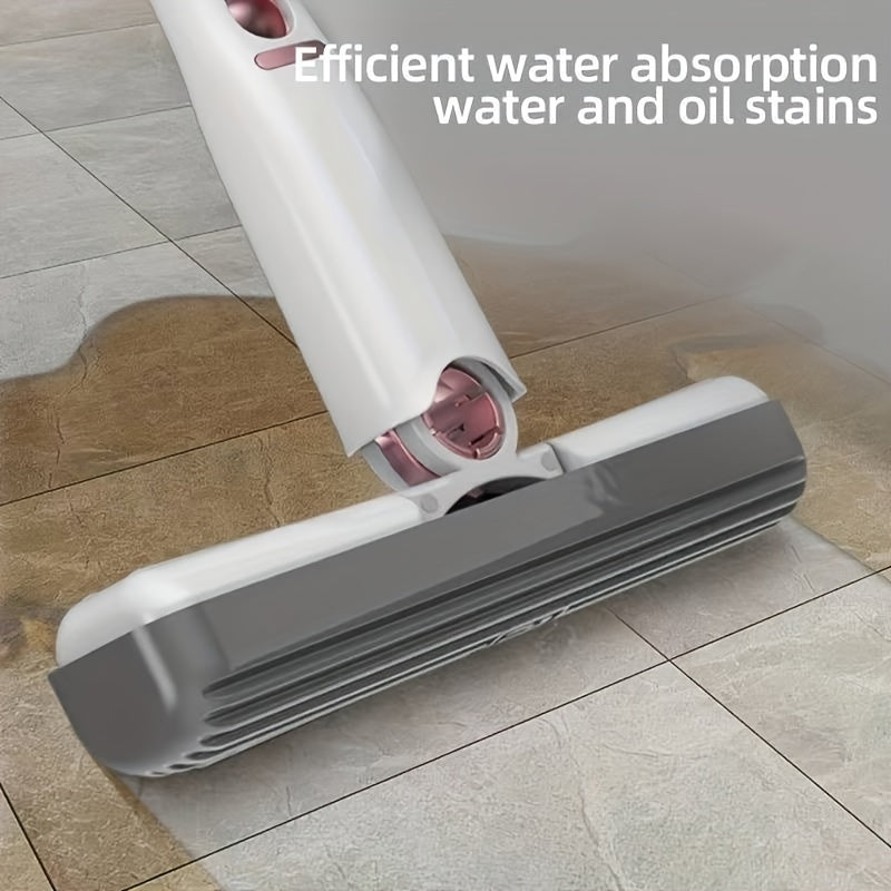 Mini self-squeeze cleaning mop absorbing water and oil stains from tiled floor surface