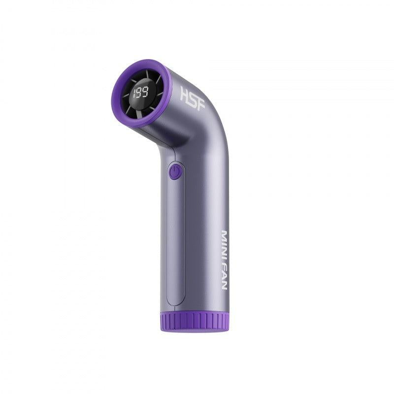 Dark grey-purple portable turbo handheld fan with digital display and compact ergonomic design