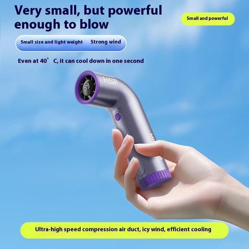 Handheld turbo mini fan with digital display showing 199 speed levels, compact and powerful cooling design