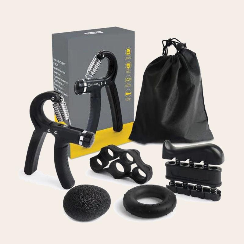 Complete black Silicone Grip Ring & Ball Set with hand grippers, finger exerciser, resistance ring, stress ball, and storage bag on beige background.