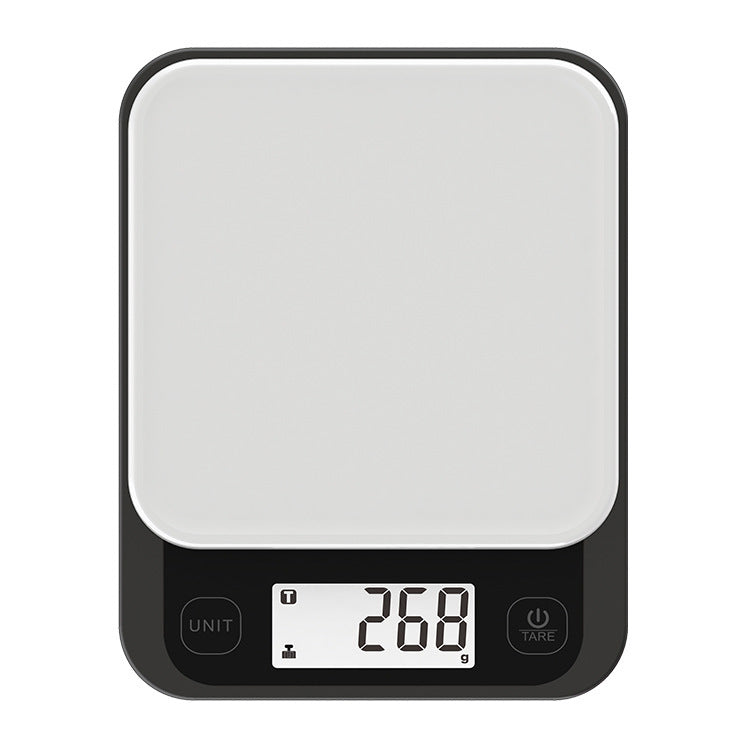 Top view of a modern smart kitchen scale with digital display showing 268 grams.