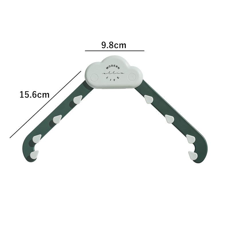 Triangular sink filter holder with labeled dimensions: 15.6 cm arms and 9.8 cm top width