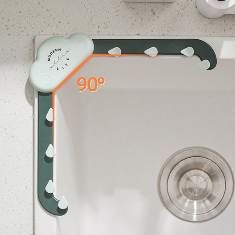 Triangular sink filter holder installed at a 90-degree angle in the corner of a kitchen sink
