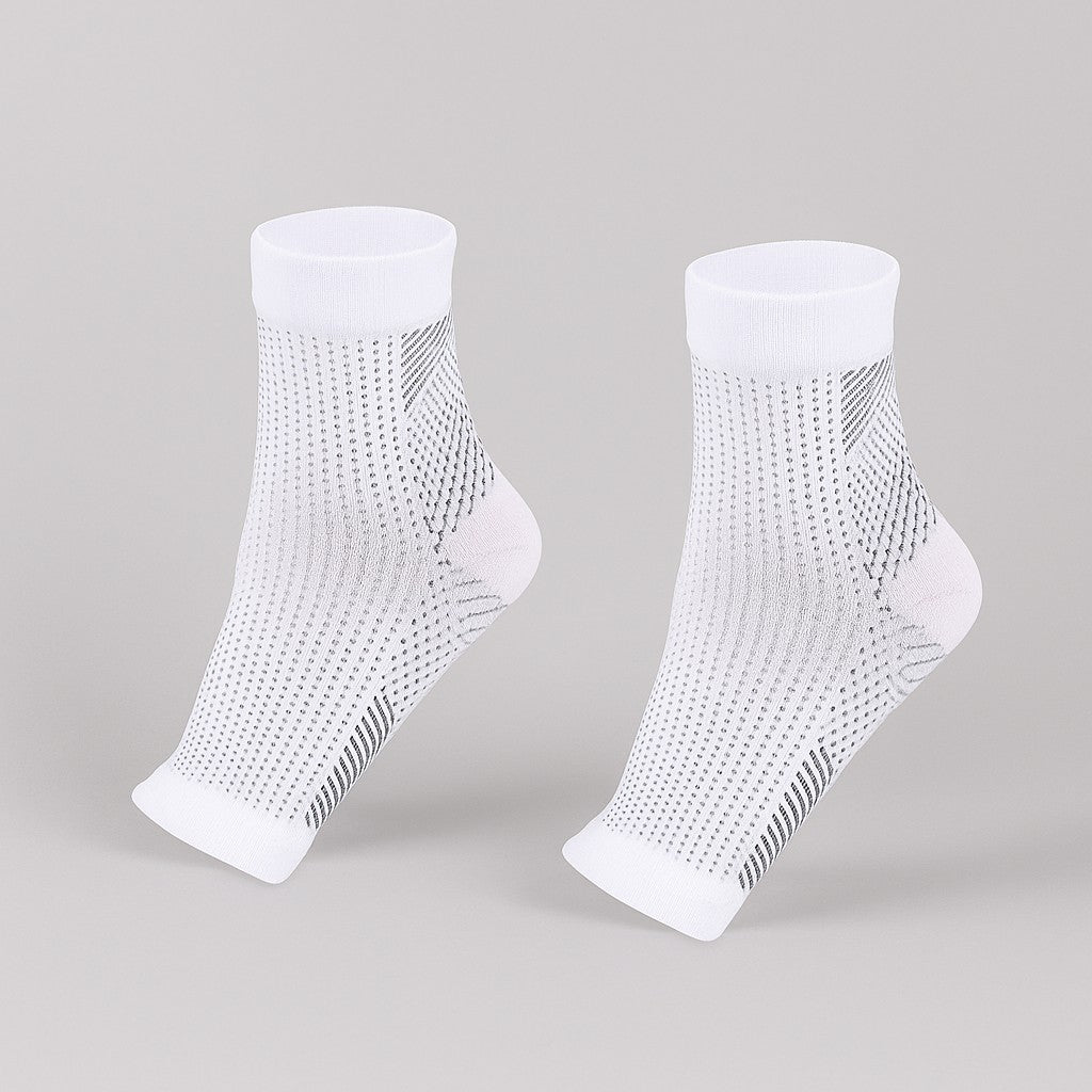 Pair of white ankle-length compression sleeves with black woven patterns, displayed on a neutral background