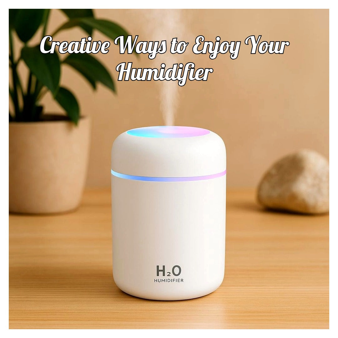 White USB colorful cup air humidifier on wooden table with green plant in background, text overlay "Creative Ways to Enjoy Your Humidifier"