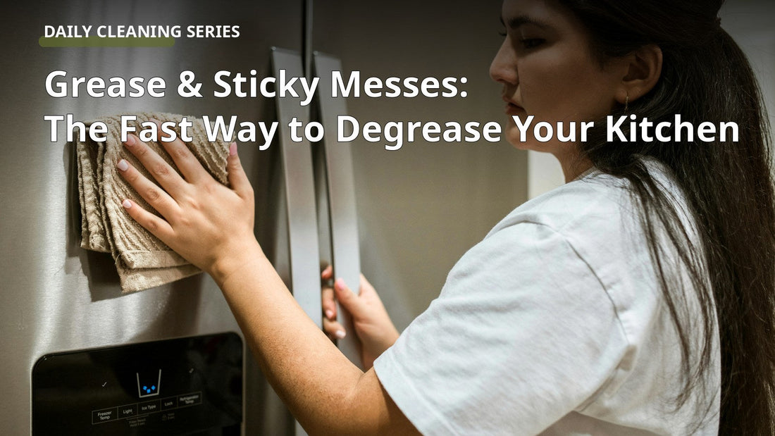 Woman wiping a stainless steel fridge door in a modern kitchen