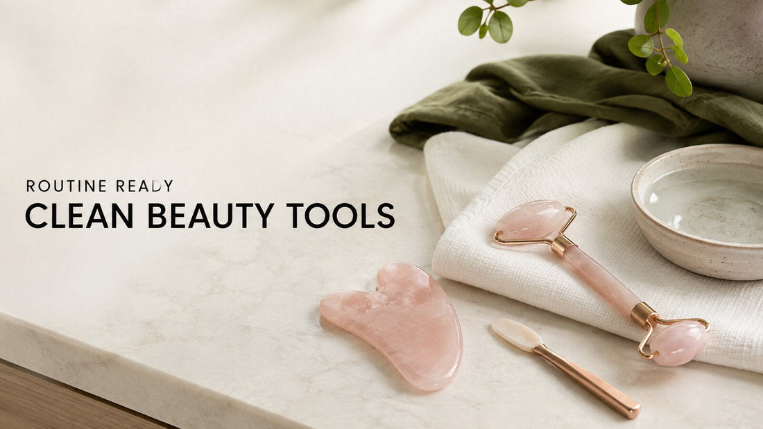 Rose quartz facial roller, gua sha, and manual beauty tools arranged for cleaning