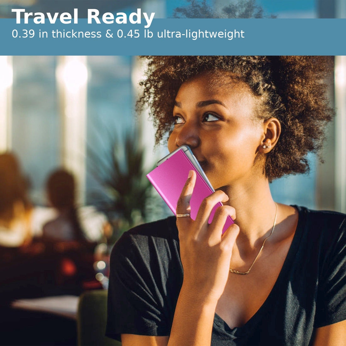 Lifestyle photo of a woman holding an ultra-slim 20,000mAh power bank, travel-ready backup power.