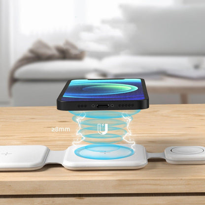 Magnetic wireless charging animation showing phone aligning above charger (≥8mm distance).