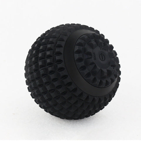 Black 4-speed electric massage ball with textured surface and power button visible