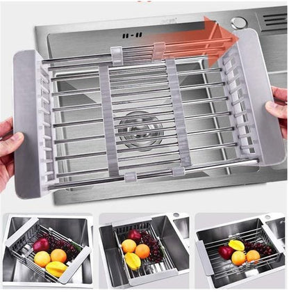 Adjustable stainless steel sink drain basket shown in use over a kitchen sink, ideal for rinsing and drying fruits and vegetables.