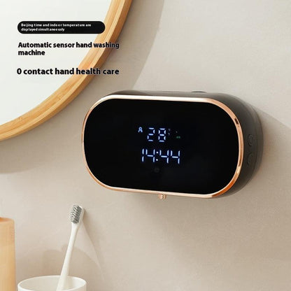 Wall-mounted automatic sensor soap dispenser with LED display, promoting touchless hand hygiene.