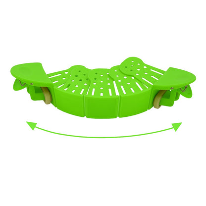 Green clip-on strainer shown flat with curved arrows indicating its adjustable bending shape, displayed on a white background.