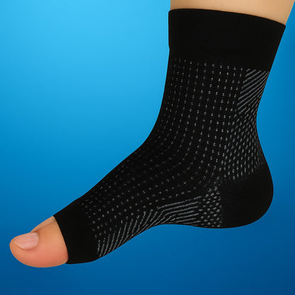 Realistic foot wearing a black compression ankle sleeve with white woven patterns and visible toes, shown on a blue background