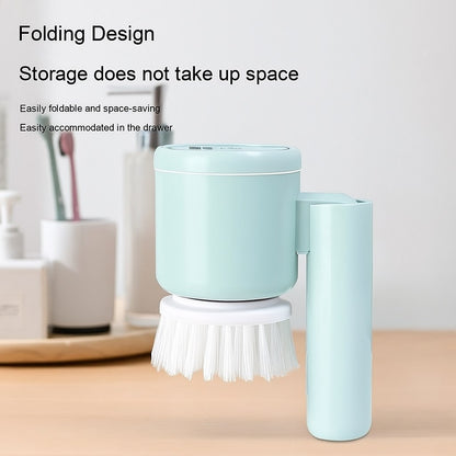 Foldable cordless floor scrubbing brush in compact storage position on a bathroom counter with modern accessories in the background.