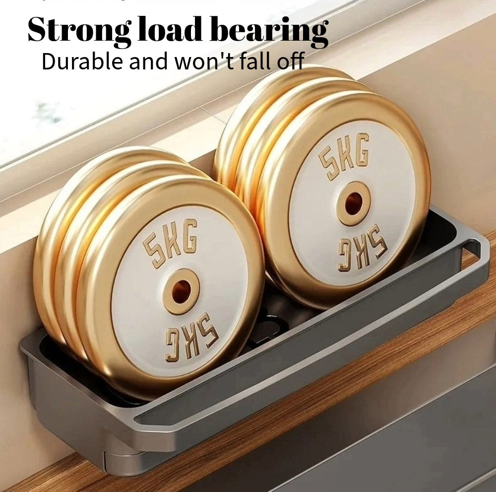 Kitchen sink storage rack demonstrating strong load-bearing capacity with multiple 5kg weight plates.