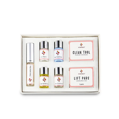 Lash Lift Kit with five bottles and two accessory boxes, neatly arranged in an open white case on a clean white background.