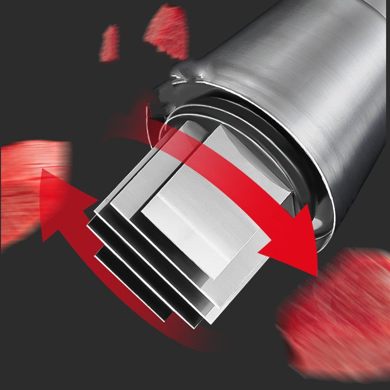 Close-up of stainless steel rotating blades inside the manual garlic and onion press.