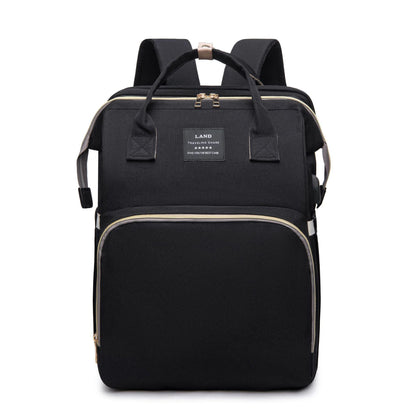 Black mummy baby backpack with front zip pocket and top handles