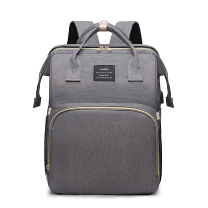 Gray Mummy Baby Crib Backpack with insulated front pocket and ergonomic straps