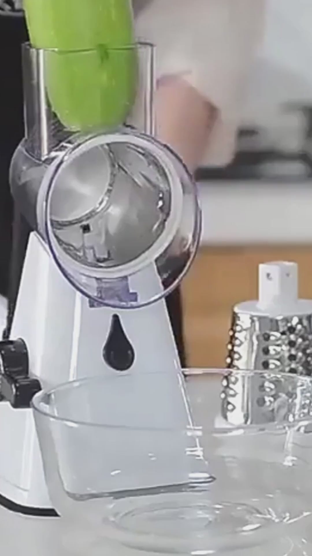 Demonstration video of the Manual 3-in-1 Vegetable Cutter showing rotary slicing and grating in action