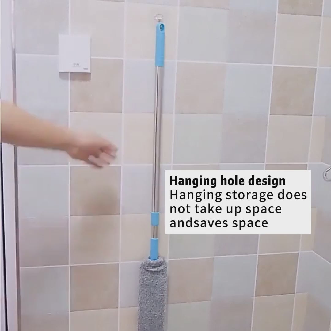 Demonstration of flat microfiber dust mop cleaning under bed and tight spaces with extendable handle