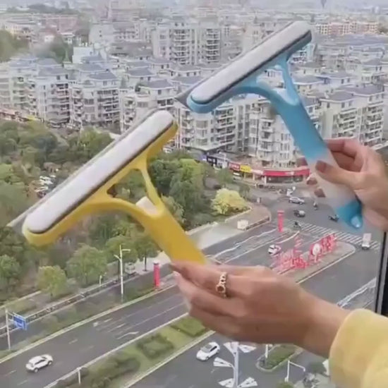 Demo video showing 3-in-1 window squeegee with spray, sponge and wiper cleaning glass and tiles