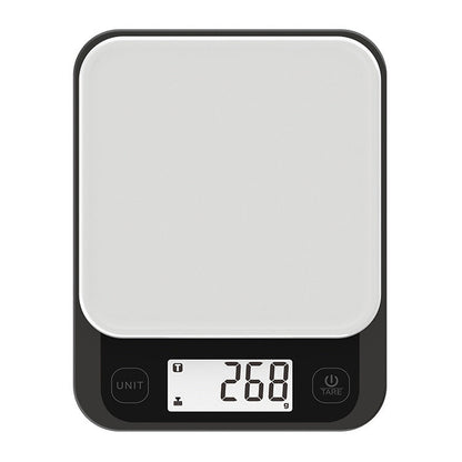 Top view of a modern smart kitchen scale with digital display showing 268 grams. 
