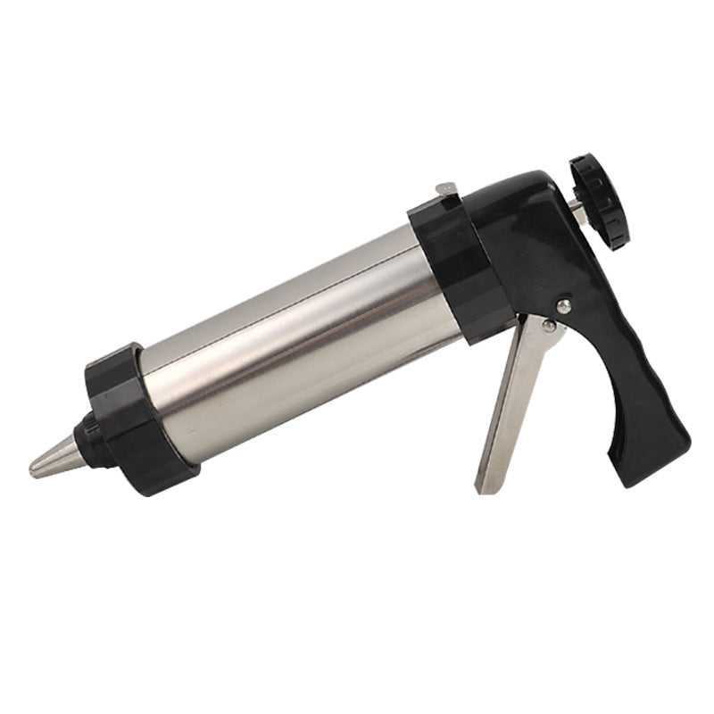 Side view of stainless steel cookie press with black handle on white background
