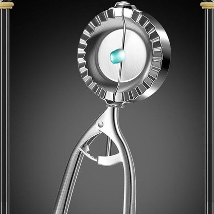 Front view of stainless steel dumpling maker showing symmetrical sealing edges