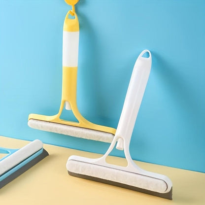 Yellow and white 3-in-1 window squeegees with spray bottles standing against blue background
