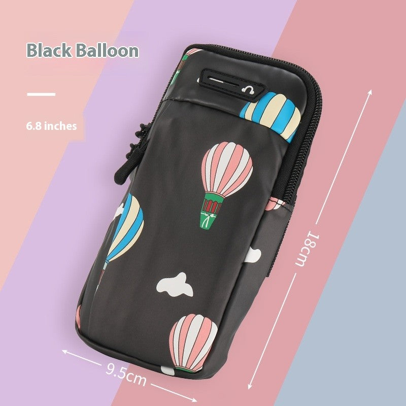 Black pouch with hot air balloon design on a colorful background
